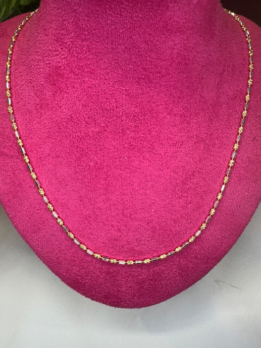 Two tone diamond cut beaded sterling silver necklace