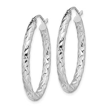 Sterling Silver Polished And Textured Oval Hoop Earrings