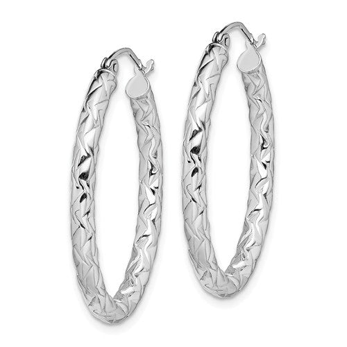 Sterling Silver Polished And Textured Oval Hoop Earrings